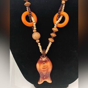 30 inch Wood Bead Pullover Necklace with Fish Pendant.